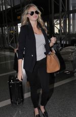 KATE UPTON at Los Angeles International Airport 12/08/15