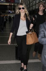 KATE UPTON at Los Angeles International Airport 12/08/15
