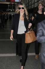 KATE UPTON at Los Angeles International Airport 12/08/15