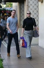 KATE UPTON Shopping at The Grove in Hollywood 12/24/2015