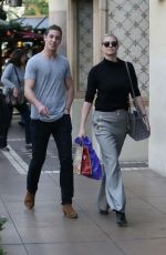 KATE UPTON Shopping at The Grove in Hollywood 12/24/2015