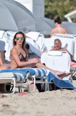 KATIE CASSIDY in Bikini at a Beach in Miami 12/23/2015
