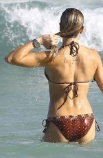 KATIE CASSIDY in Bikini at a Beach in Miami 12/28/2015