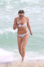 KATIE CASSIDY in Bikini on the Beach in Miami 12/27/2015