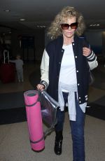 KIM BASINGER Arrives at LAX Airport in Los Angeles 12/21/2015