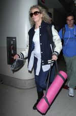 KIM BASINGER Arrives at LAX Airport in Los Angeles 12/21/2015
