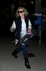 KIM BASINGER Arrives at LAX Airport in Los Angeles 12/21/2015
