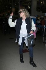 KIM BASINGER Arrives at LAX Airport in Los Angeles 12/21/2015