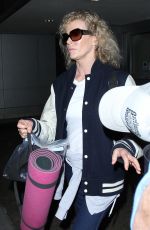 KIM BASINGER Arrives at LAX Airport in Los Angeles 12/21/2015