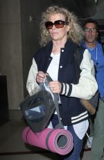 KIM BASINGER Arrives at LAX Airport in Los Angeles 12/21/2015