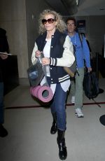 KIM BASINGER Arrives at LAX Airport in Los Angeles 12/21/2015