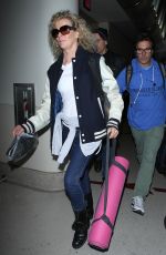 KIM BASINGER Arrives at LAX Airport in Los Angeles 12/21/2015