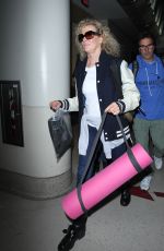 KIM BASINGER Arrives at LAX Airport in Los Angeles 12/21/2015
