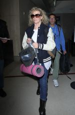 KIM BASINGER Arrives at LAX Airport in Los Angeles 12/21/2015