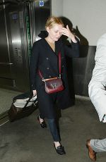 KIRSTEN DUNST at Los Angeles International Airport 12/12/2015