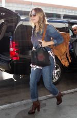 LEANN RIMES in Jeans at LAX Airport 12/08/2015
