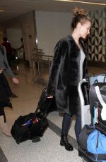 LESLIE MANN Arrives at LAX Airport in Los Angeles 12/22/2015
