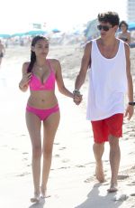 MADISON BEER in Pink Bikini at a Beach in miami 12/29/2015