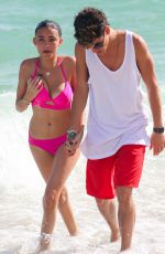 MADISON BEER in Pink Bikini at a Beach in miami 12/29/2015