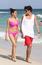 MADISON BEER in Pink Bikini at a Beach in miami 12/29/2015