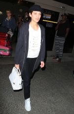 MARION COTILLARD at Los Angeles International Airport 12/02/2015