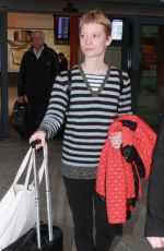 MIA WASIKOWSKA at Heathrow Airport in London 12/03/2015