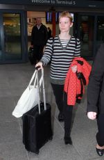MIA WASIKOWSKA at Heathrow Airport in London 12/03/2015