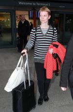 MIA WASIKOWSKA at Heathrow Airport in London 12/03/2015