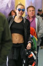 MILEY CYRUS at Vancouver International Airport 12/14/2015