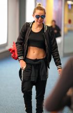 MILEY CYRUS at Vancouver International Airport 12/14/2015