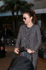 MIRANDA KERR at Los Angeles International Airport 12/27/2015