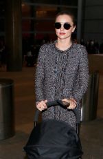 MIRANDA KERR at Los Angeles International Airport 12/27/2015