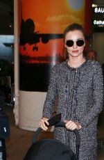 MIRANDA KERR at Los Angeles International Airport 12/27/2015
