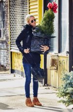 NICKY HILTON Carrying a Christmas Tree in the East Village 12/04/2015