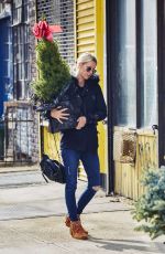 NICKY HILTON Carrying a Christmas Tree in the East Village 12/04/2015