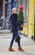 NICKY HILTON Carrying a Christmas Tree in the East Village 12/04/2015