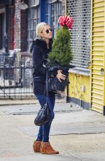 NICKY HILTON Carrying a Christmas Tree in the East Village 12/04/2015