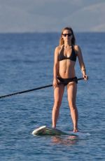 OLIVIA WILDE in Bikini Paddleboarding in Maui 12/14/2015