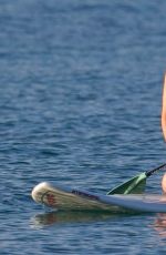 OLIVIA WILDE in Bikini Paddleboarding in Maui 12/14/2015