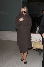 PAMELA ANDERSON at LAX Airport in Los Angeles 12/09/2015