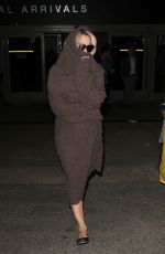 PAMELA ANDERSON at LAX Airport in Los Angeles 12/09/2015