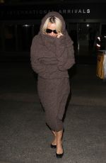 PAMELA ANDERSON at LAX Airport in Los Angeles 12/09/2015