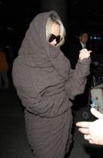 PAMELA ANDERSON at LAX Airport in Los Angeles 12/09/2015