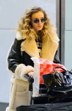 PERRIE EDWARDS Arrives at Heathrow Airport in London 12/01/2015