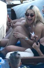 PIXIE GELDOF, RITA ORA and DAISY LOWE at a Pool in Miami 12/29/2015