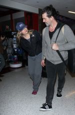 RENEE ZELLWEGER at LAX Airport in Los Angeles 12/29/2015