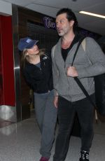 RENEE ZELLWEGER at LAX Airport in Los Angeles 12/29/2015