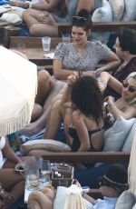 RITA ORA and DAISY LOWE in Bikinis at a Pool in Miami 12/29/2015