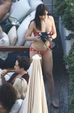 RITA ORA and DAISY LOWE in Bikinis at a Pool in Miami 12/29/2015
