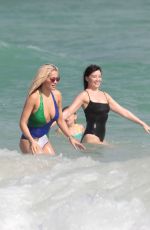 RITA ORA and DAISY LOWE in Swimsuits at a Beach in Miami 12/28/2015